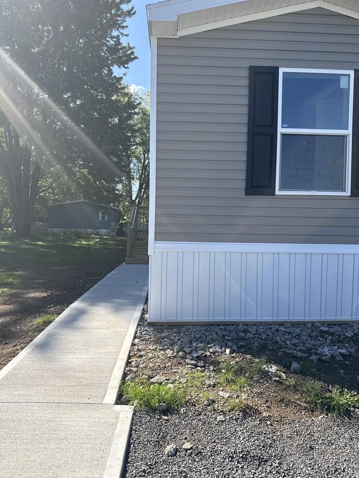 Orchard Grove Mobile Home Community exterior of home for sale