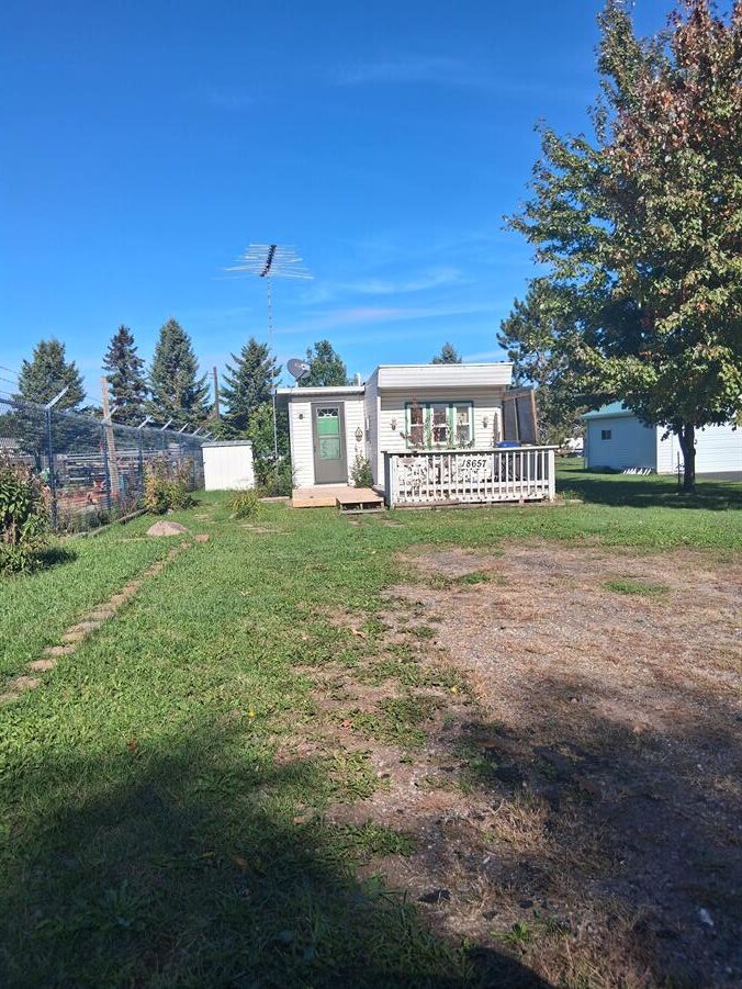 Pokegama Lake Resort Mobile Home Community exterior of home for sale